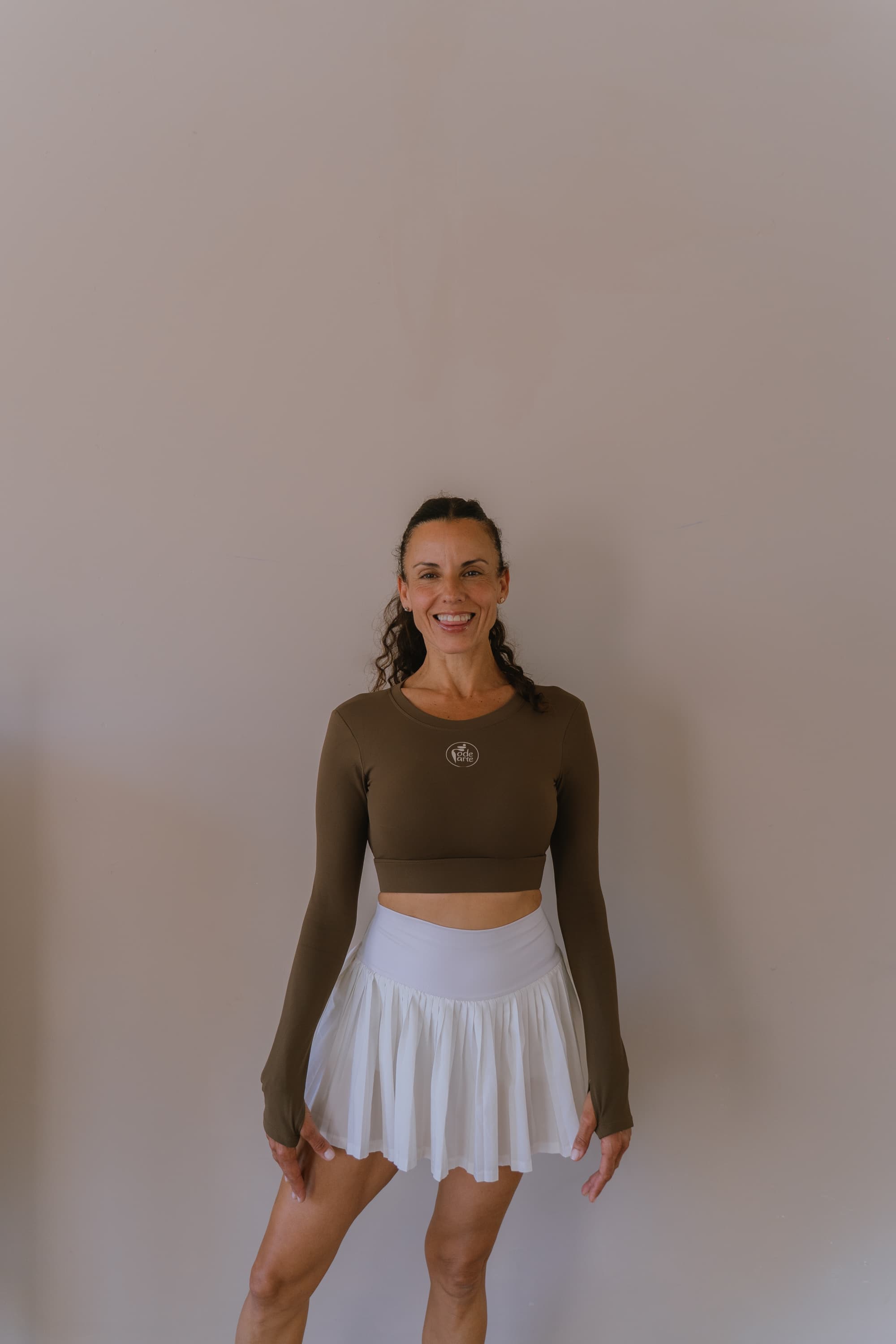 Vanesa, fundadora de Rodearte, sonriendo en el estudio
